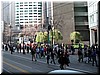 Thousands of marchers and onlookers continue to arrive and head towards the starting point.