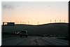 Sunrise and view of wind electric generators, en route on 580