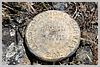 Mustang peak marker - it says 'US Gelogical Survey. 250 Dollar fine for disturbing this mark'